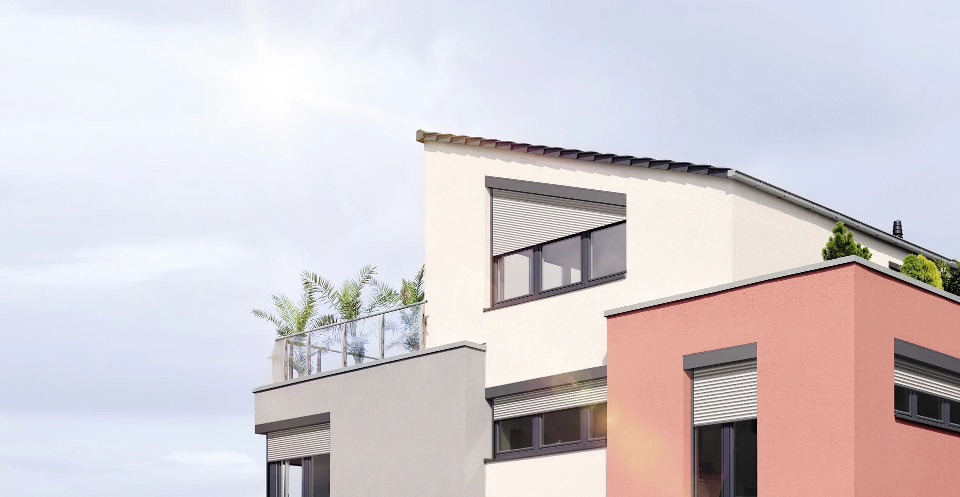 Moderne Architektur eines mehrfarbigen Wohnhauses mit Sonnenterrasse